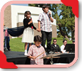 Betancourt children perform “God Bless the USA”